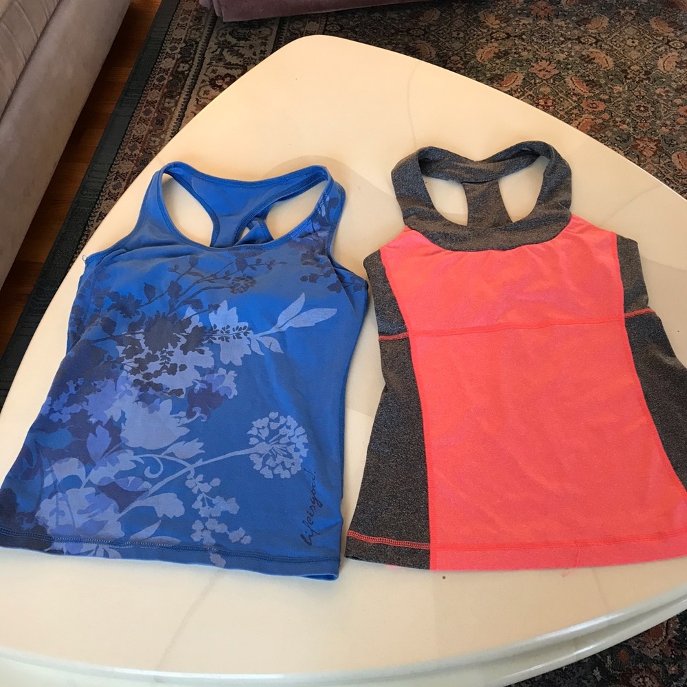 Two women’s yoga tops. Size XS